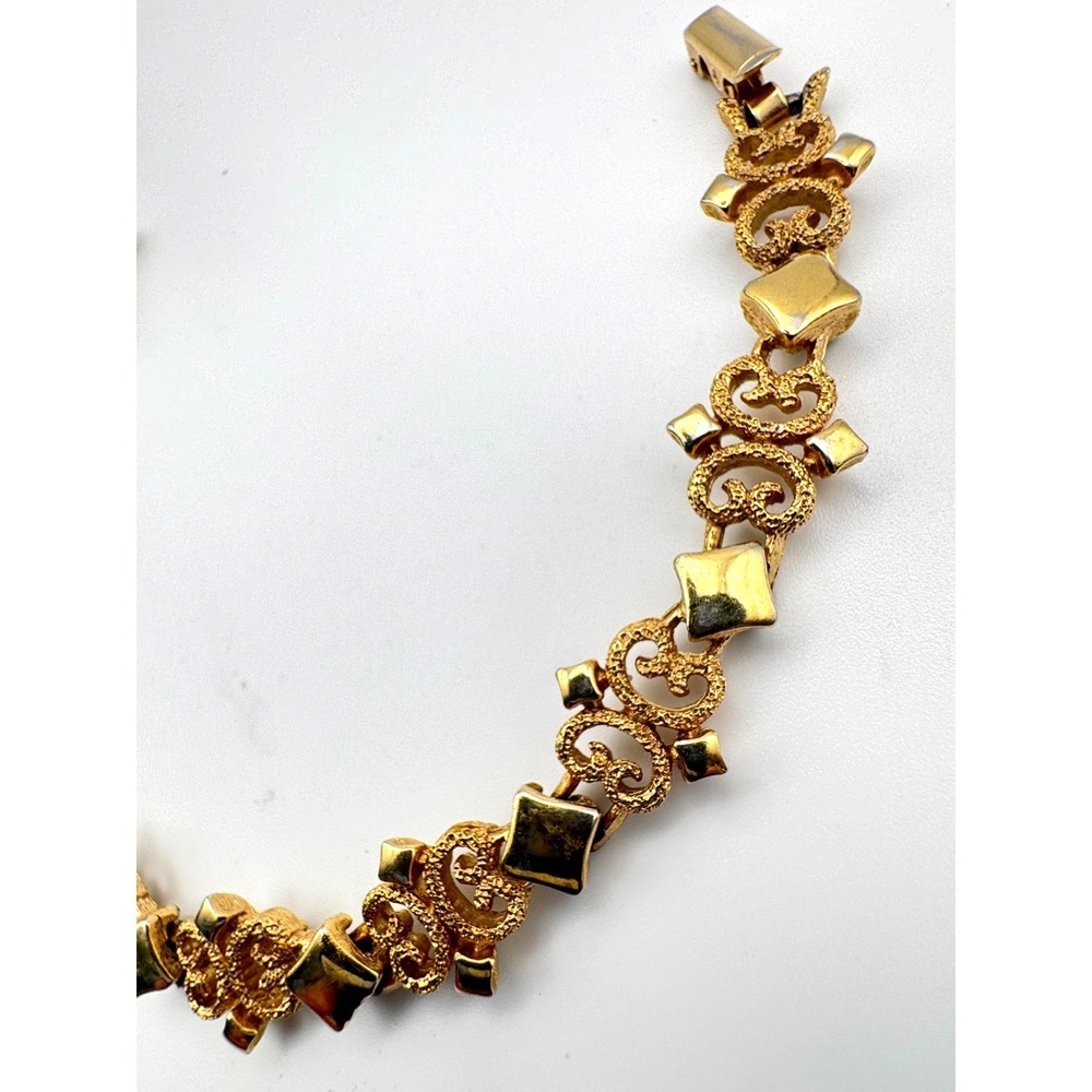 Vintage Avon Bracelet Precious Pretenders Gold Tone Scroll Link 1971